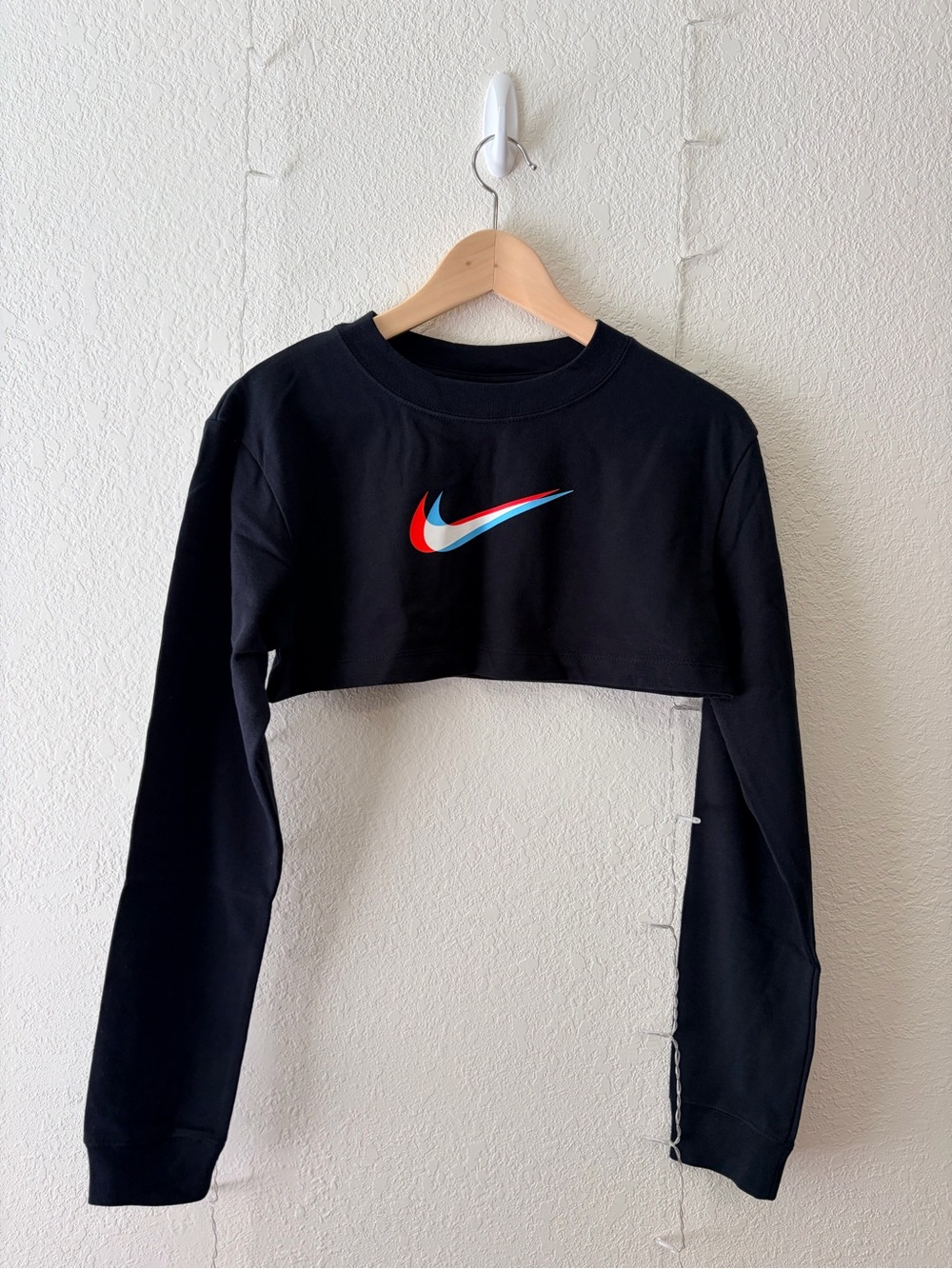 Nike Black Cropped Long Sleeve Top with White Swoosh - Women's